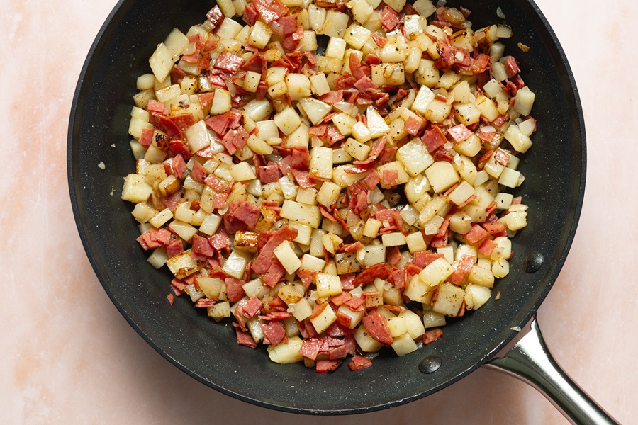 Healthy and Easy Breakfast Skillet Recipe with Potatoes and Salami in a Frying Pan