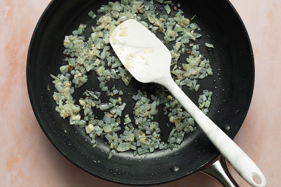 Healthy and Easy Breakfast Skillet Recipe with Potatoes Onions in a Skillet