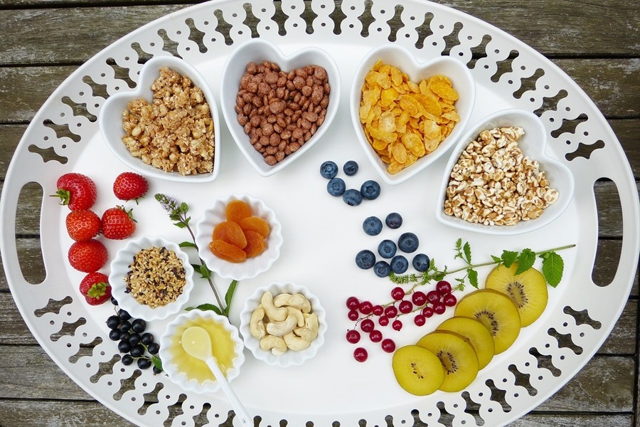 Jillian Michaels 30 Day Shred Meal Plan a Serving Platter Filled with Heart-Shaped Bowls Filled with Different Nuts and Grains