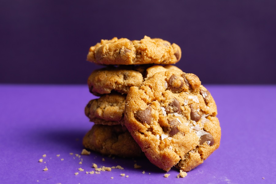 Air Fryer Peanut Butter Cookies without Flour a Small Stack of Cookies on a Purple Background