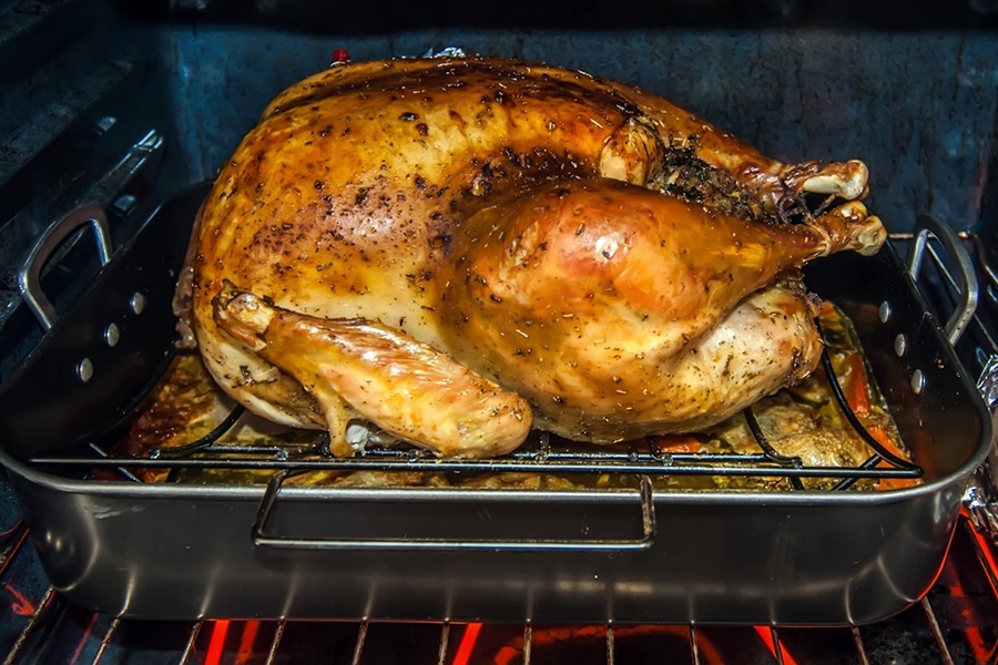 Healthy Leftover Turkey Recipes Close Up of a Turkey Cooking in an Oven