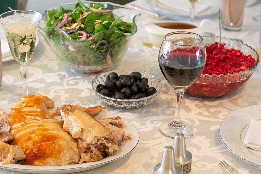 Healthy Leftover Turkey Recipes Close Up of a Carved Turkey on a Table Set for Dinner