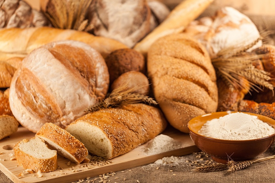 Is Sourdough Bread Good for Diabetics Loaves of bread on Wooden Cutting Board