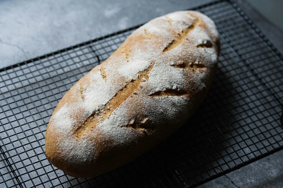 Is Sourdough Bread Good for Diabetics a Loaf of Bread on a Wire Cooling Rack