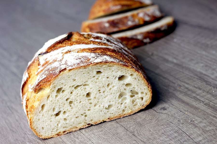 Is Sourdough Bread Good for Diabetics a Loaf of Bread with Three Slices Cut Out and Placed to the Side