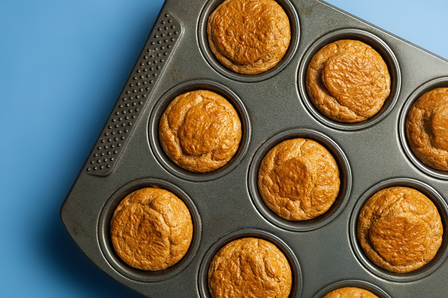 Easy Keto Almond Flour Bread Recipe Close Up of a Muffin Pan Filled with Almond Flour Bread Rolls