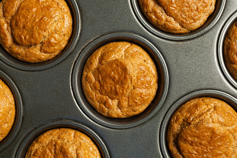 Easy Keto Almond Flour Bread Recipe Close Up of a Muffin Tin Filled with Almond Flour Bread Rolls