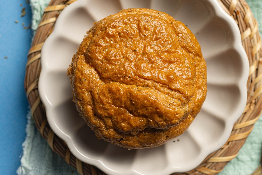 Easy Keto Almond Flour Bread Recipe Close Up of an Almond Flour Bread Roll on a Plate