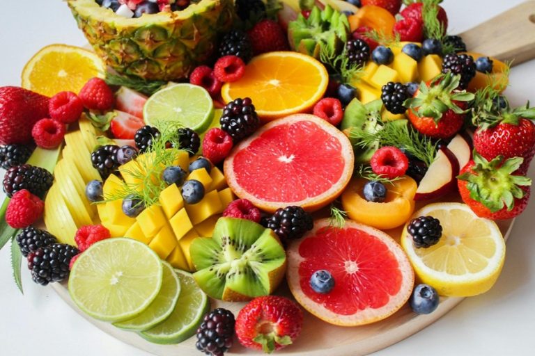 Fat Burning Juice Recipes a Collection of Sliced Fruits and Whole Fruits on a Serving Platter