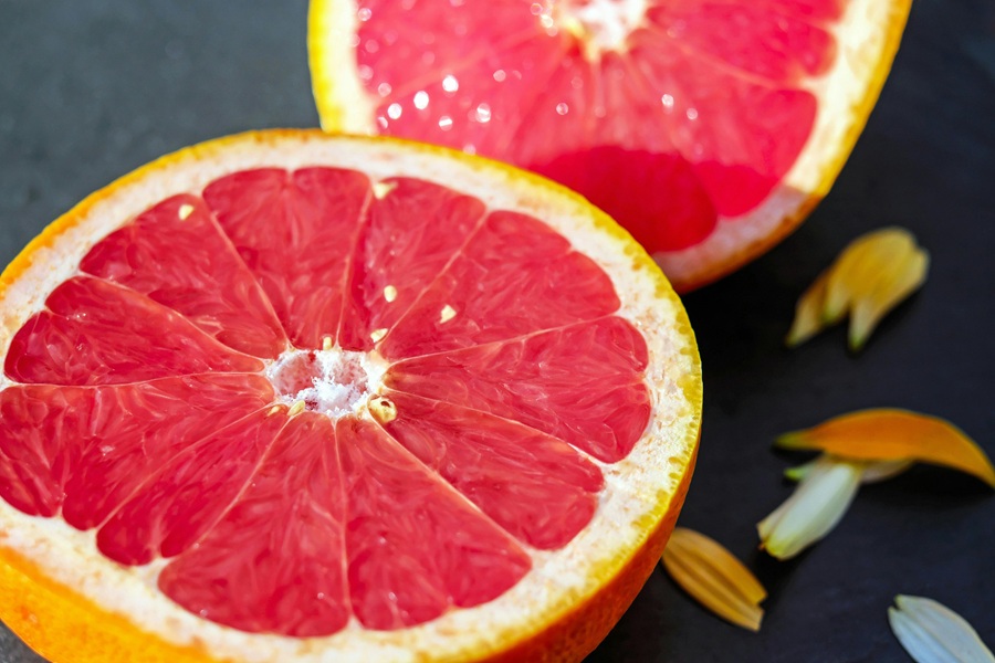 Fat Burning Juice Recipes  Close Up of Two Grapefruit Slices