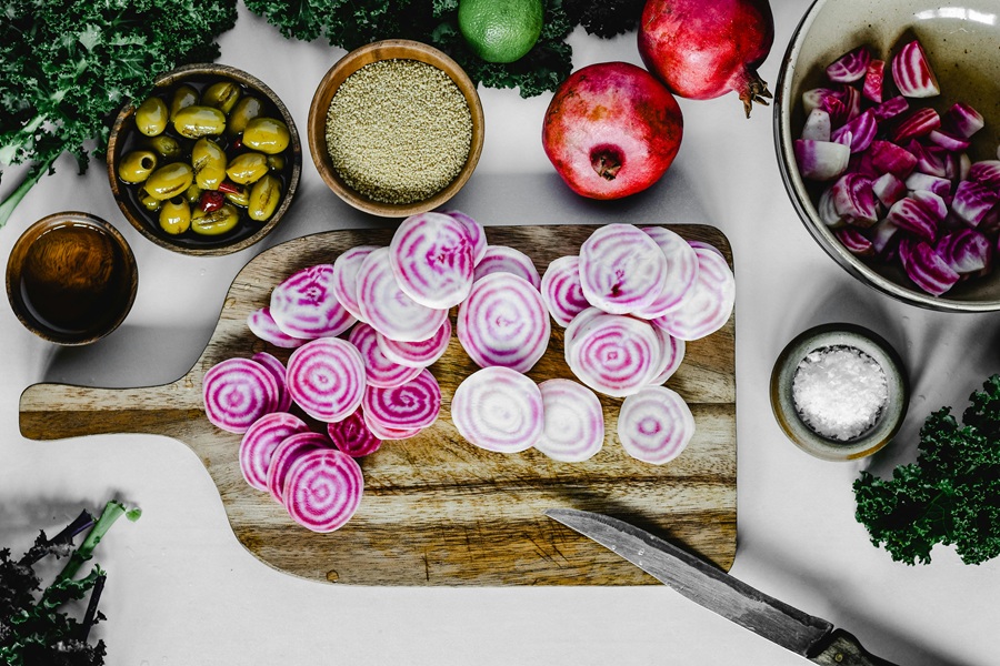 Fat Burning Juice Recipes  Sliced beets on a Wooden Cutting Board