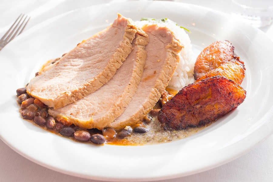 Can I Put a Frozen Pork Roast in the Crockpot Sliced Pork on a Plate with Potatoes