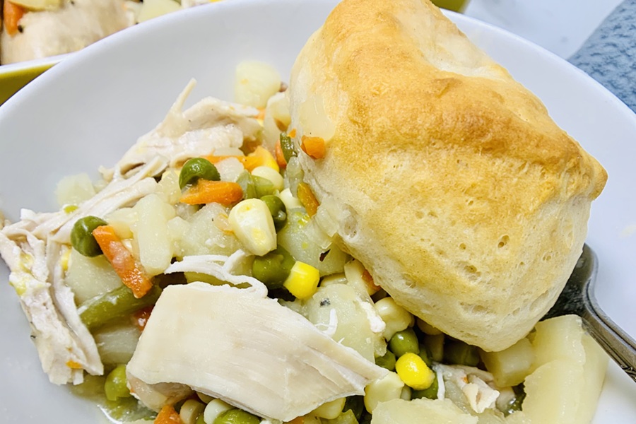 Chicken Pot Pie with Biscuits on Top of a Plate