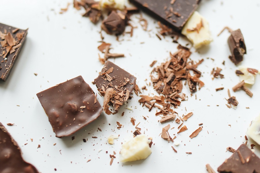 Crockpot Candy Recipes with Almond Bark Close Up of Chocolate with Almonds Broken into Pieces