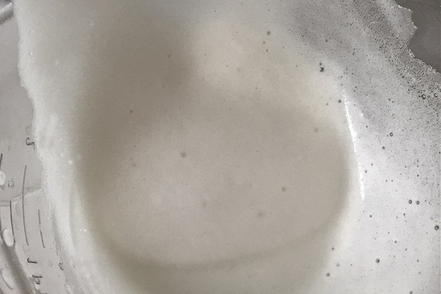 Easy Chocolate Dairy Free Cupcakes Close Up of Aquafaba in a Bowl