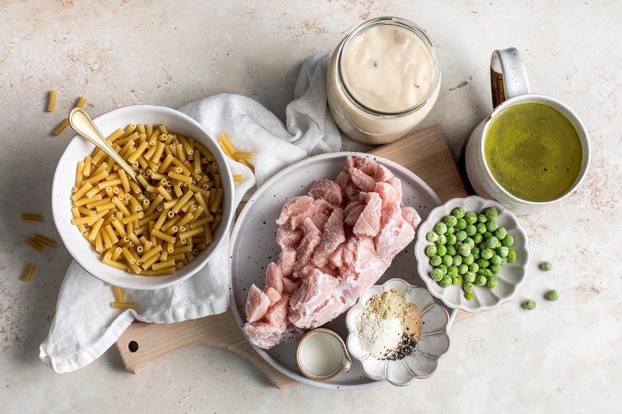 Easy Leftover Turkey and Noodles Recipe Casserole Ingredients Separated Into Bowls on a Counter Top