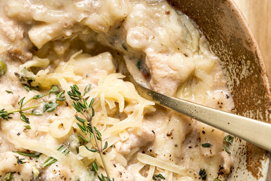 Easy Leftover Turkey and Noodles Recipe Extreme Close Up of the Casserole with the Spoon
