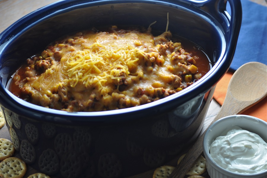 Funny Crockpot Quotes About Life Close Up of a Crockpot Filled with Chili and Topped with Cheese