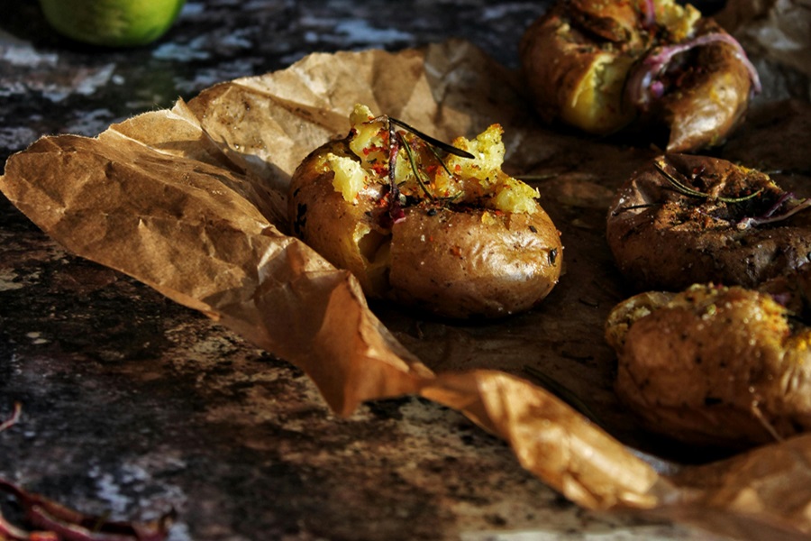 Baked Potatoes in the Oven Close Up of Baked Potatoes on Paper