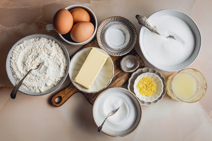 Lemon Bar Recipe Ingredients Separated into Bowls