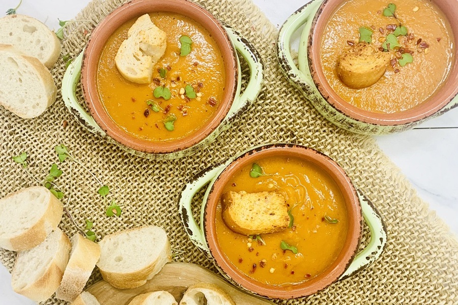 Easy Red Pepper Tomato Soup Overhead View of Soup in Bowls with Bread