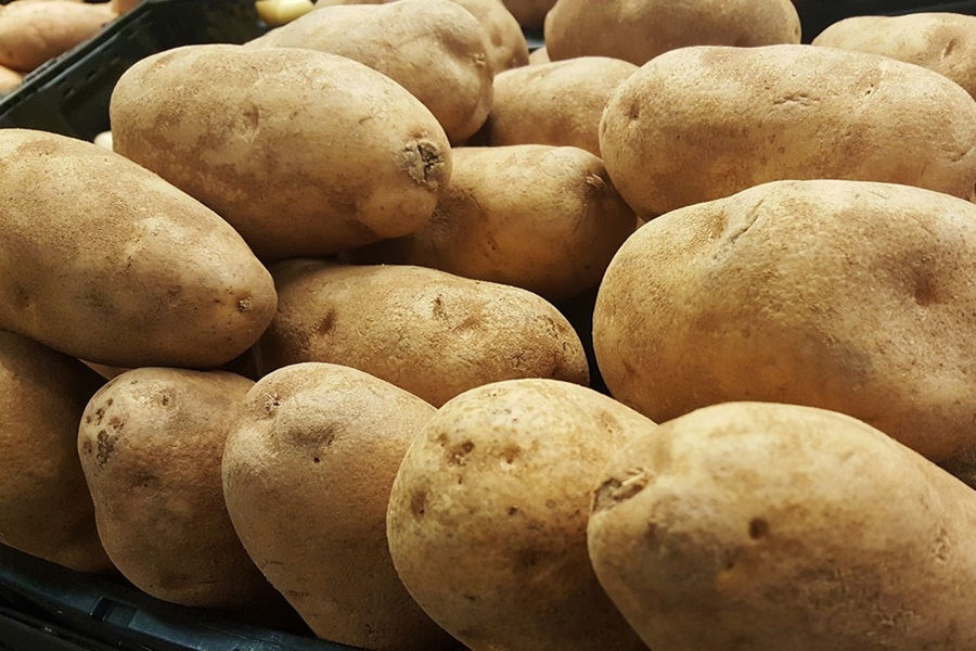 Baked Potatoes in the Oven Close Up of Potatoes