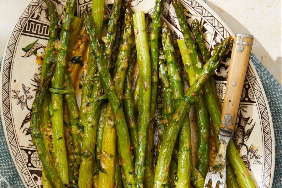 Healthy Easter Dinner Side Dishes a Serving Platter of Roasted Asparagus with Herb-Lemon Vinaigrette