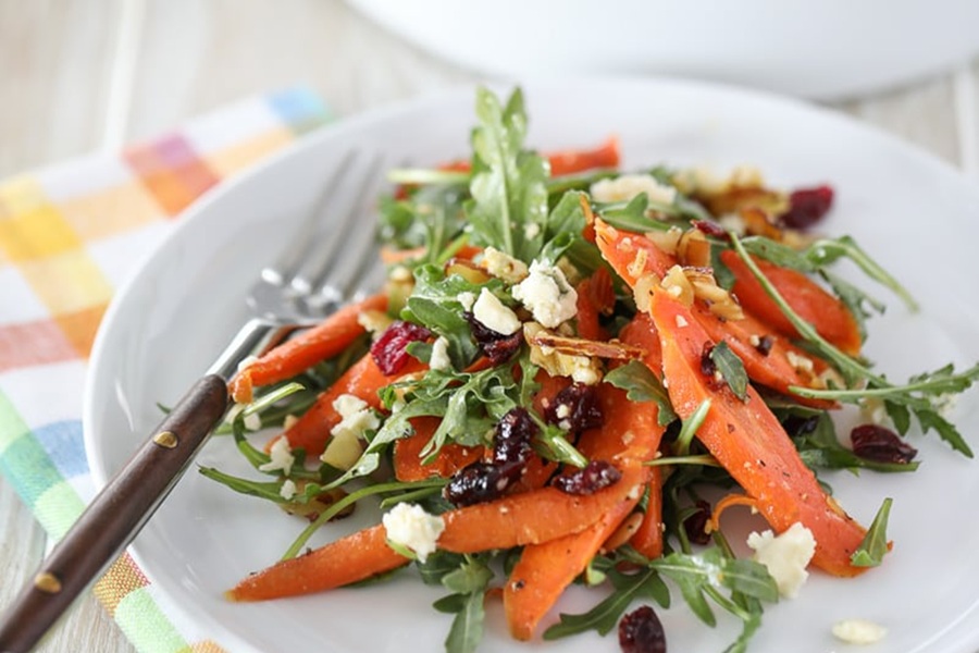 Healthy Easter Dinner Side Dishes Roasted Carrot Salad on a Plate with a Fork