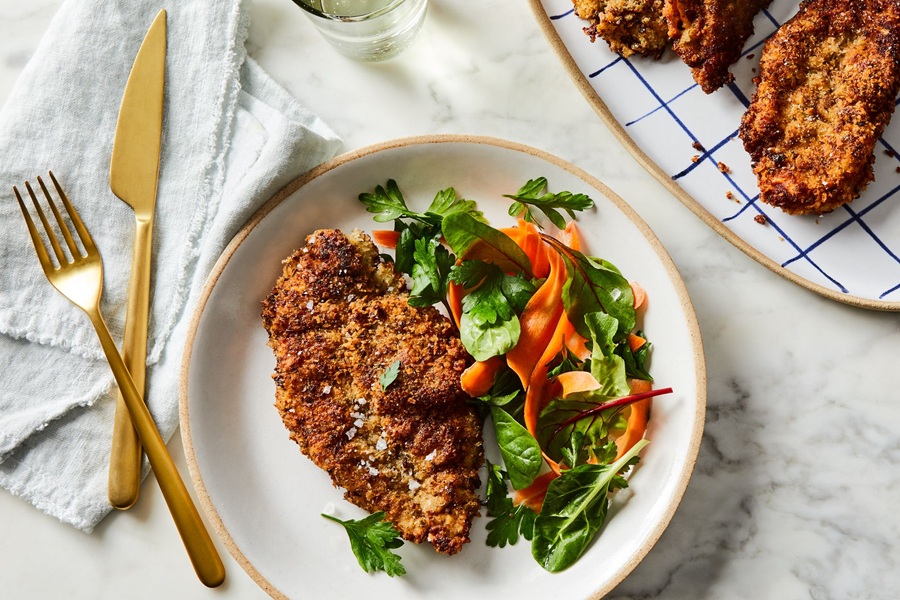 Dinner Ideas for Mother's Day Ranch Chicken Cutlet on a White Plate with a Small Salad