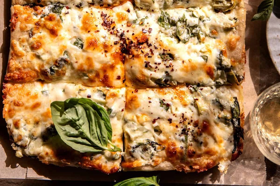 Dinner Ideas for Mother's Day Close Up of Artichoke Dip Pizza