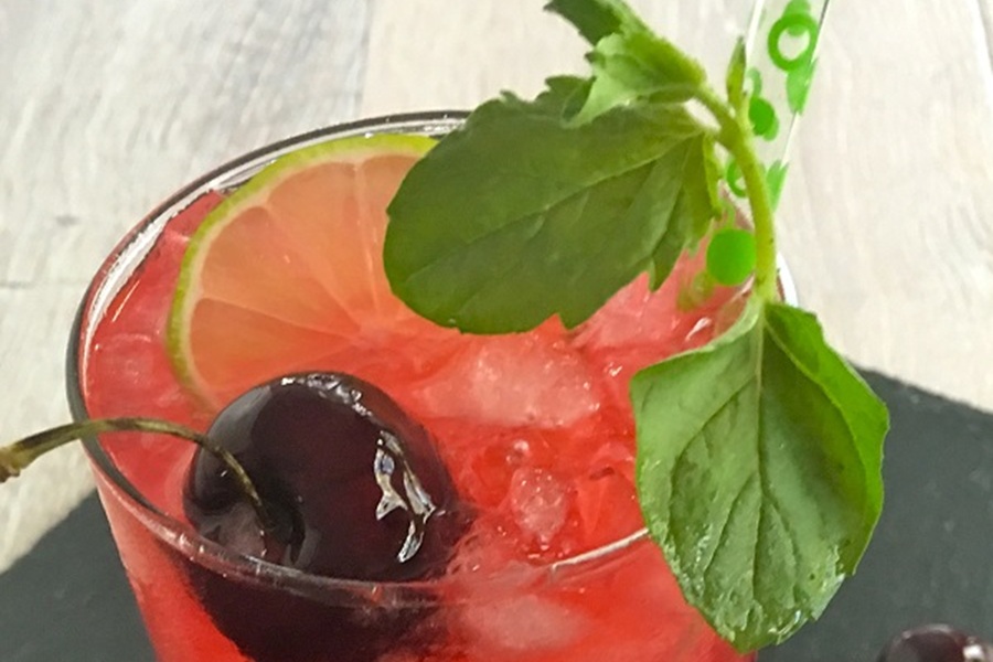 Best Boating Drinks Cherry Blackberry Mojito Garnished with a Cherry