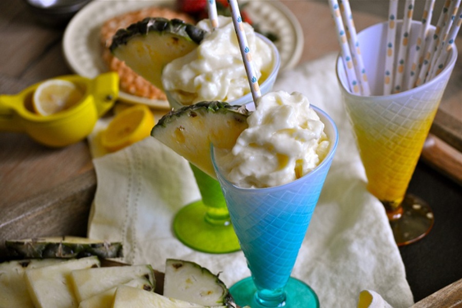 Memorial Day Weekend Recipes Make at Home Dole Whip Recipe in Two Colorful GLasses