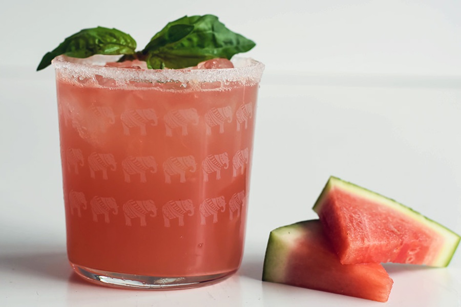 Summer Margarita Recipes Watermelon & Basil Margarita Next to Two Small Watermelon Wedges