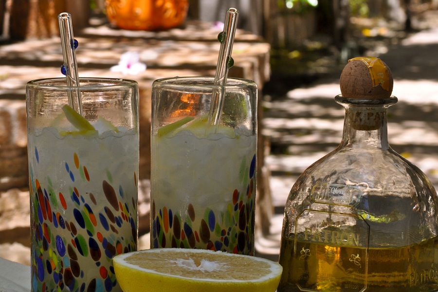 Summer Margarita Recipes Patrón Grapefruit Margarita Next to a Half a Grapefruit and a Bottle of Patron