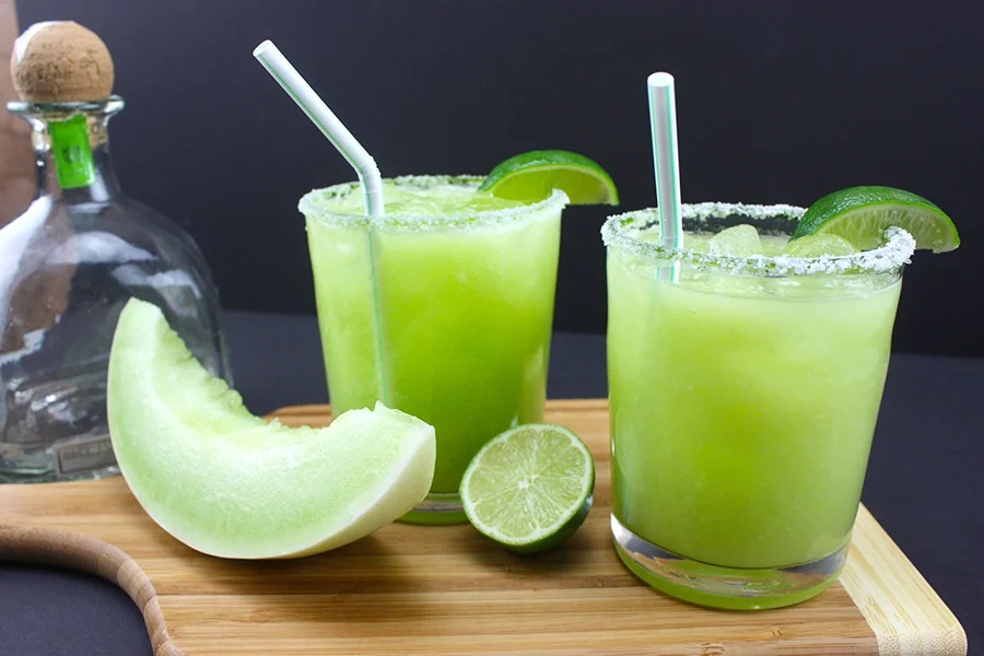Summer Margarita Recipes Two Honeydew Margaritas Next to Sliced Honeydew and Limes