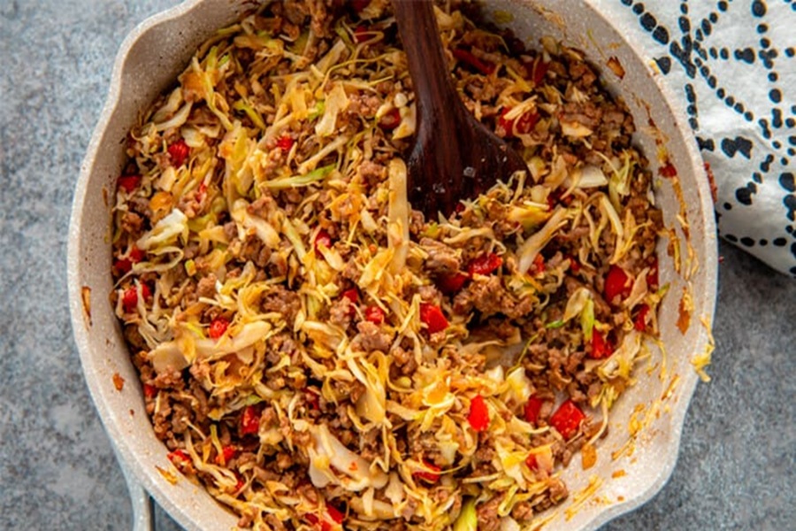 Dairy Free Ketogenic Recipes SPICY Keto Egg Roll Bowls in a White Bowl with a Spoon
