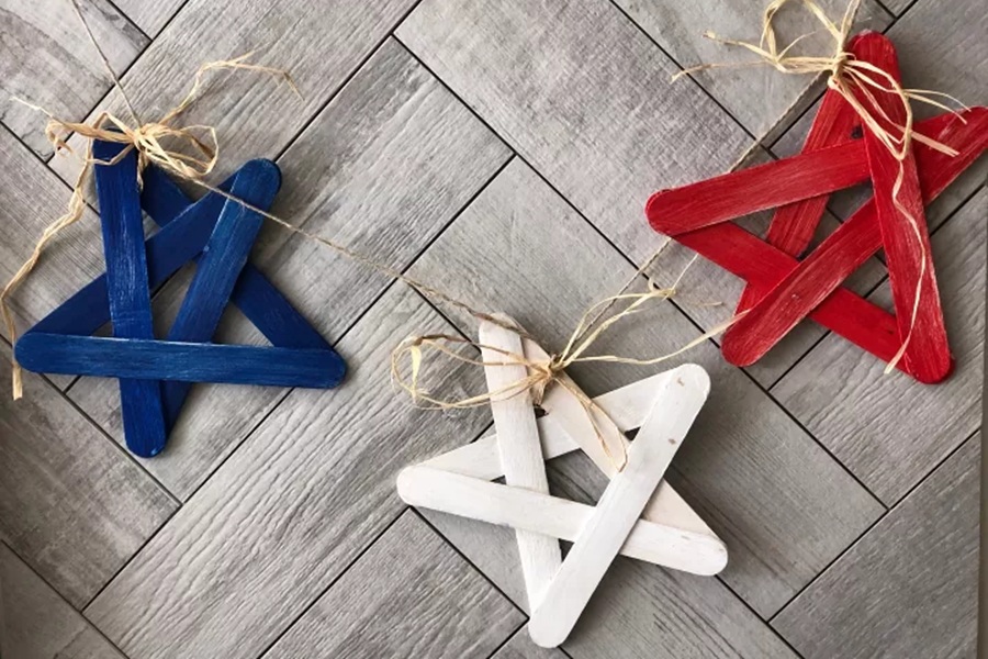 DIY Patriotic Decorations Red, White, and Blue Popsicle Stick Garland with One Star in Each Color Red White and Blue
