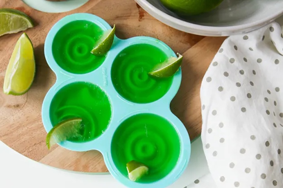 Easy Margarita Jello Shots Fancy Margarita Jello Shots in Molds on a Wooden Surface