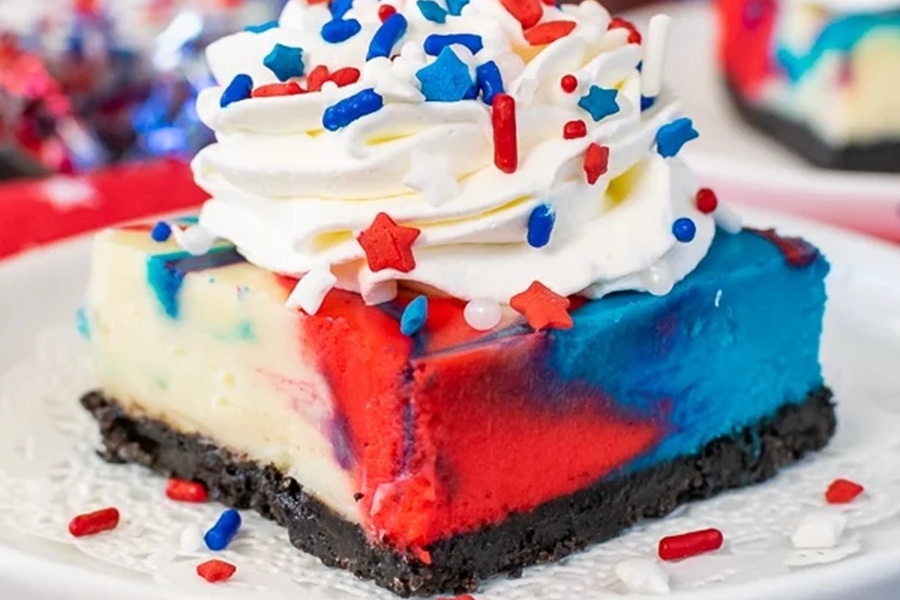 Patriotic Dessert Recipes Close Up of Red White and Blue Cheesecake Bars