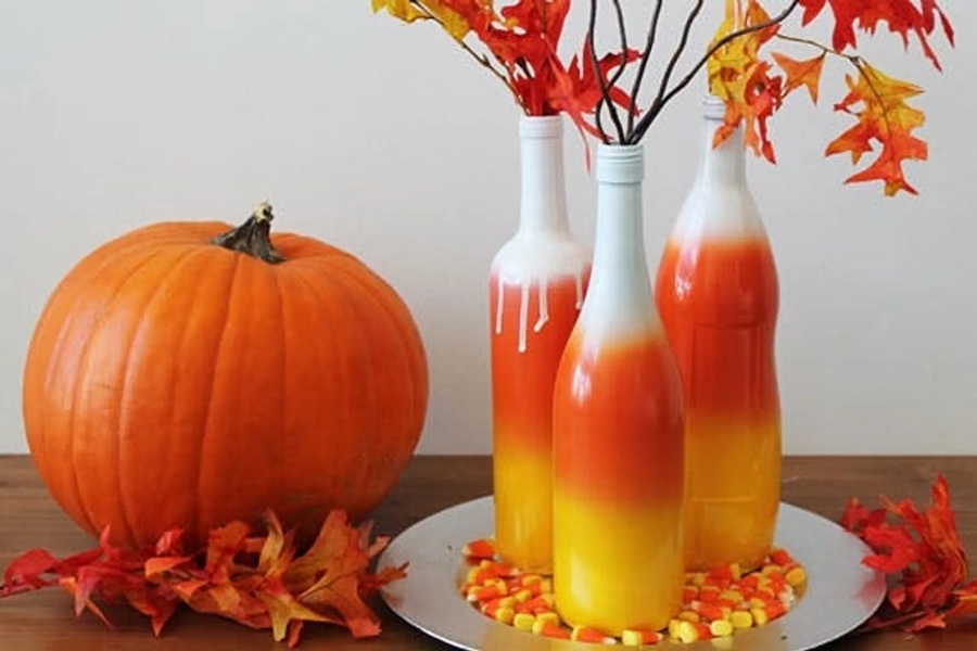 DIY Halloween Decorations Ombre Wine Bottles Orange Yellow and White to Mimic Candy Corn