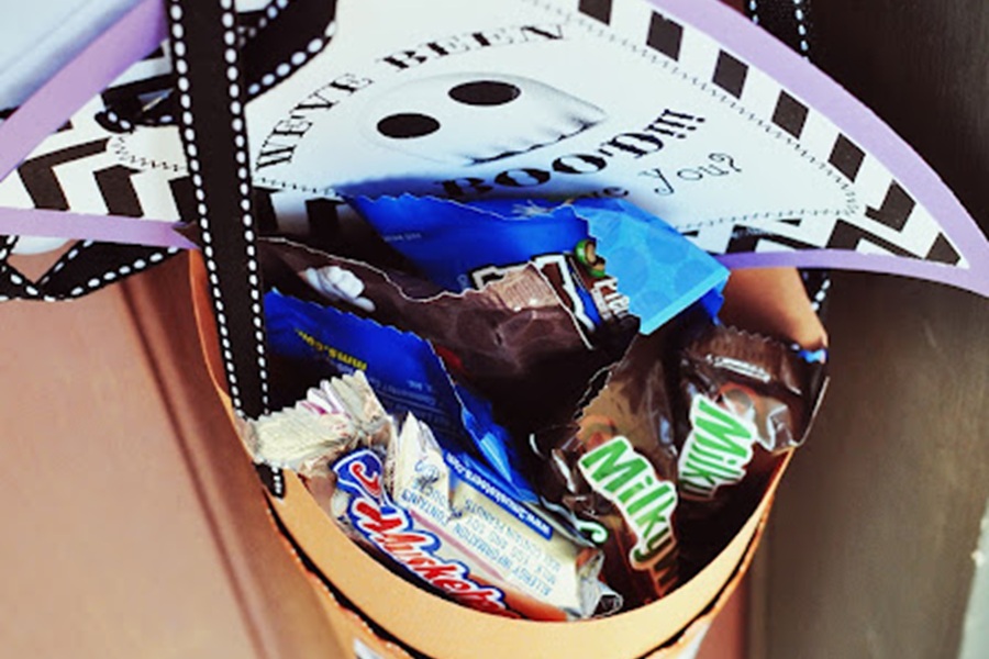 You&rsquo;ve Been BOOed a Treat Bag Hanging From a Front Door Knob with a Booed Printable Inside